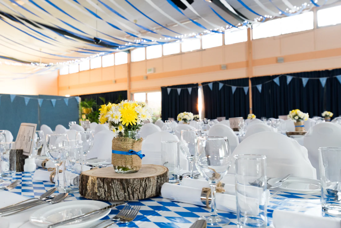 Tiered celebration cake on a decorated table